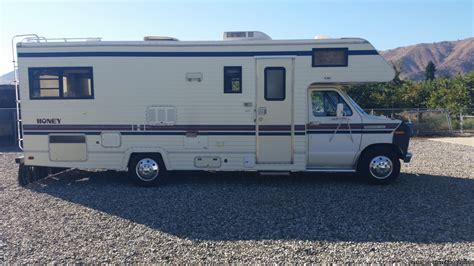 Keeping your motorhome shiny and clean can extend its life. . 1989 ford honey motorhome